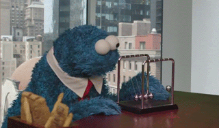 bored muppet at office animated gif